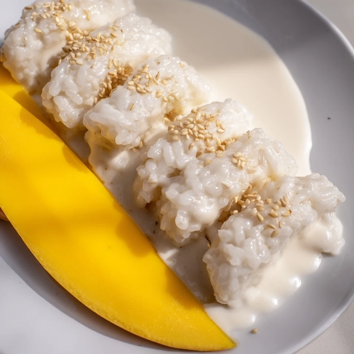 Sweet, sticky rice and ripe mangoes create a beautiful, delicious Thai Mango Sticky Rice dessert.