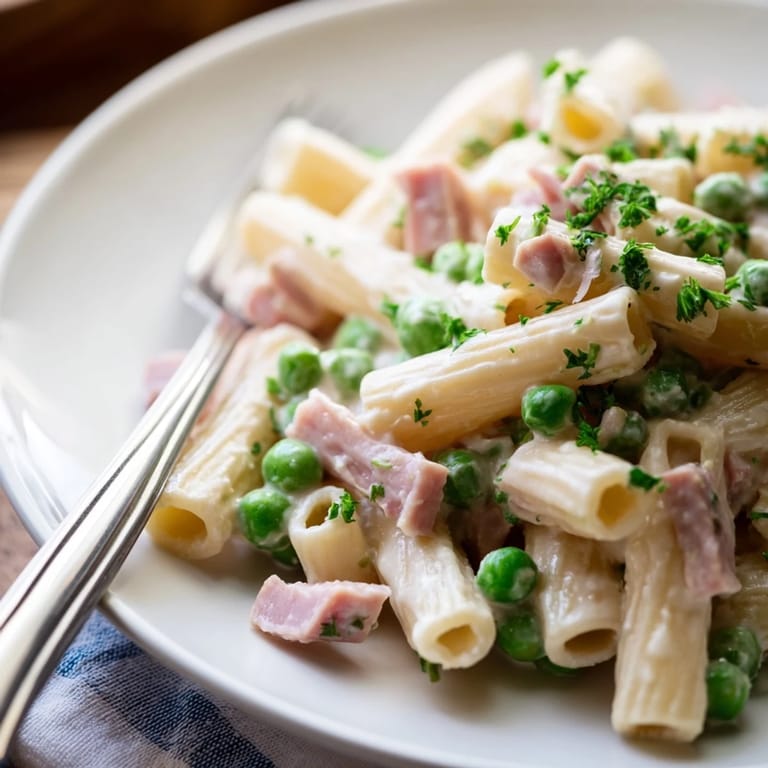 Tossing penne in a creamy sauce with sweet spring peas and leftover ham for a quick, comforting dinner.